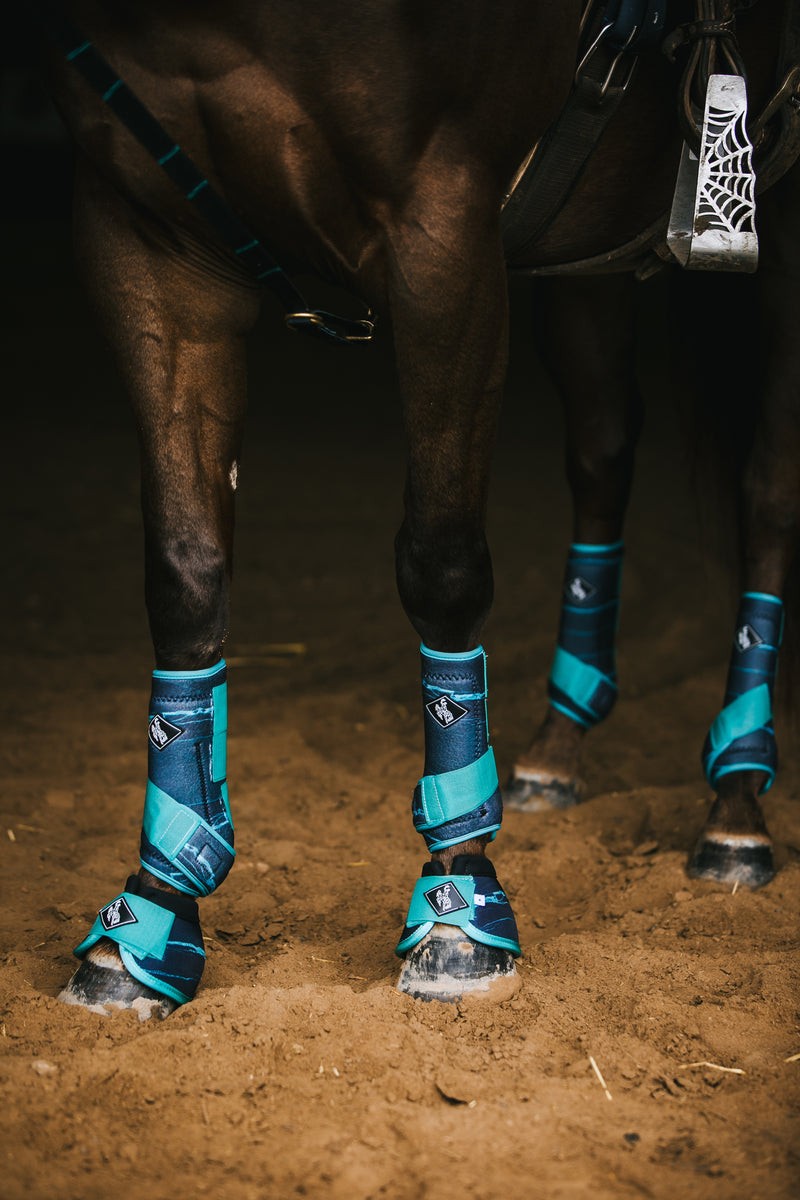 teal splint boots